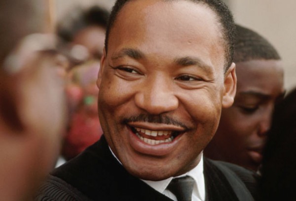 Martin-Luther-King-smiles-w-church-family-at-news-he-won-Nobel-Peace-Prize-110864-by-Flip-Schulke-Corbis