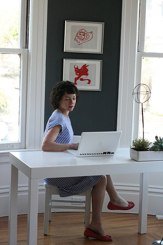 Courtney Skott at her desk